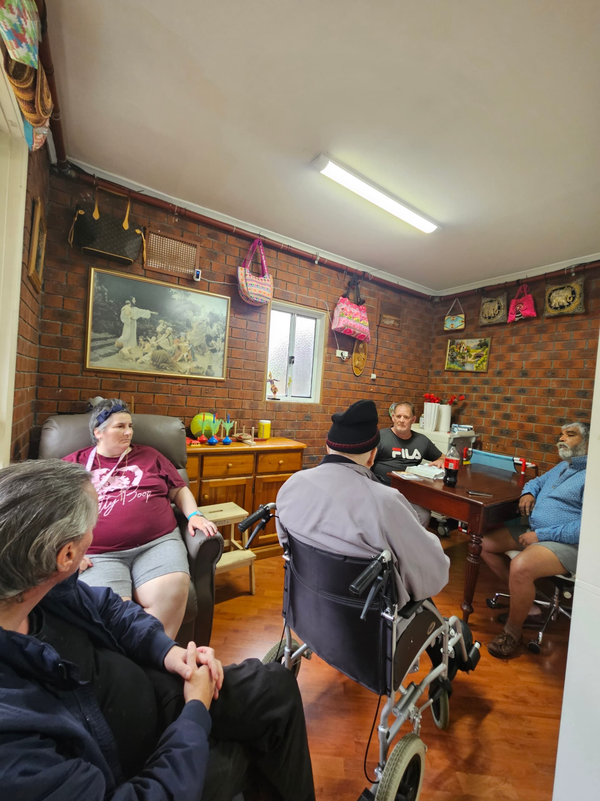 Residents gathered together in the lounge room