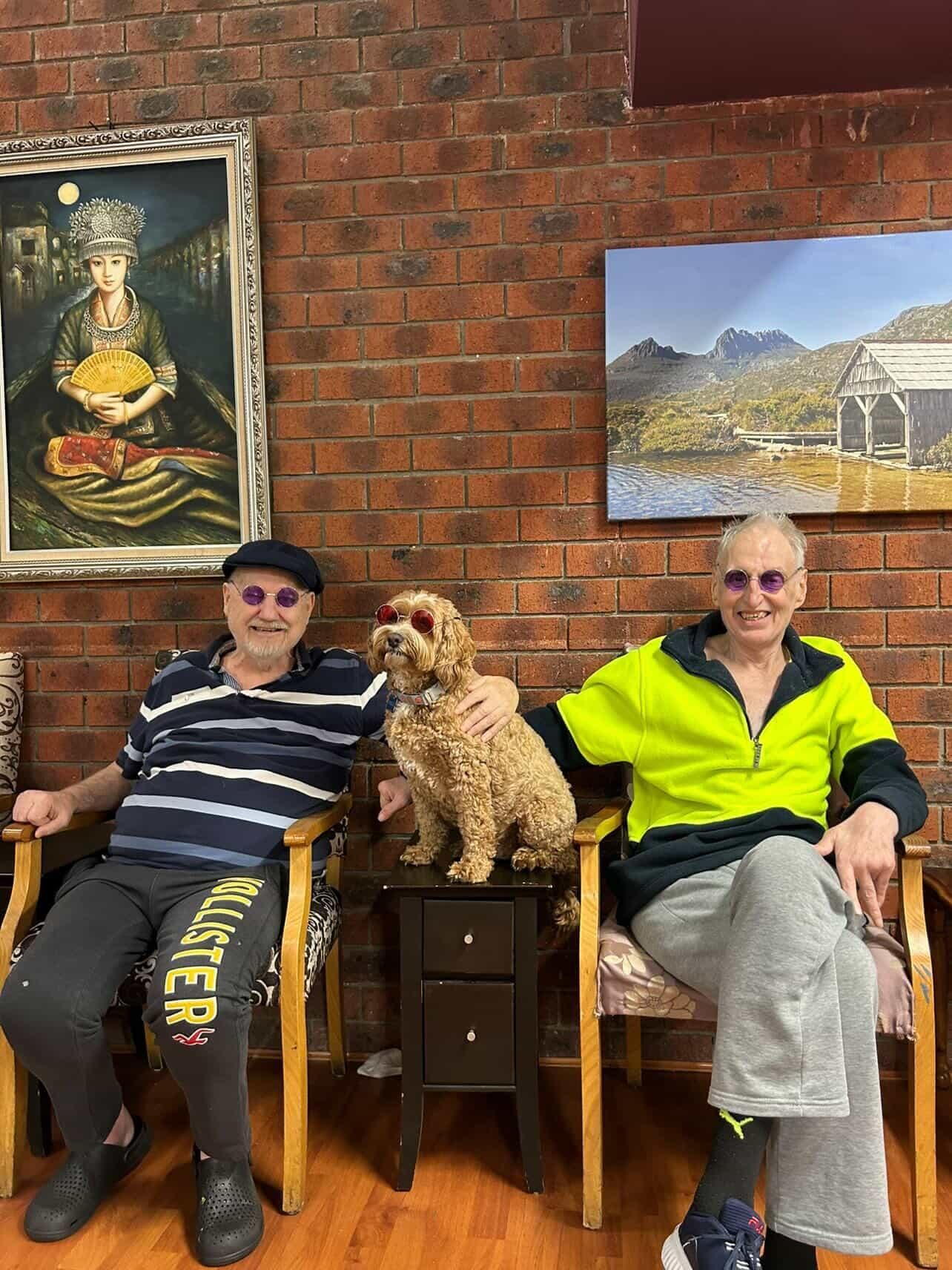 Residents and their dog in the common lounge