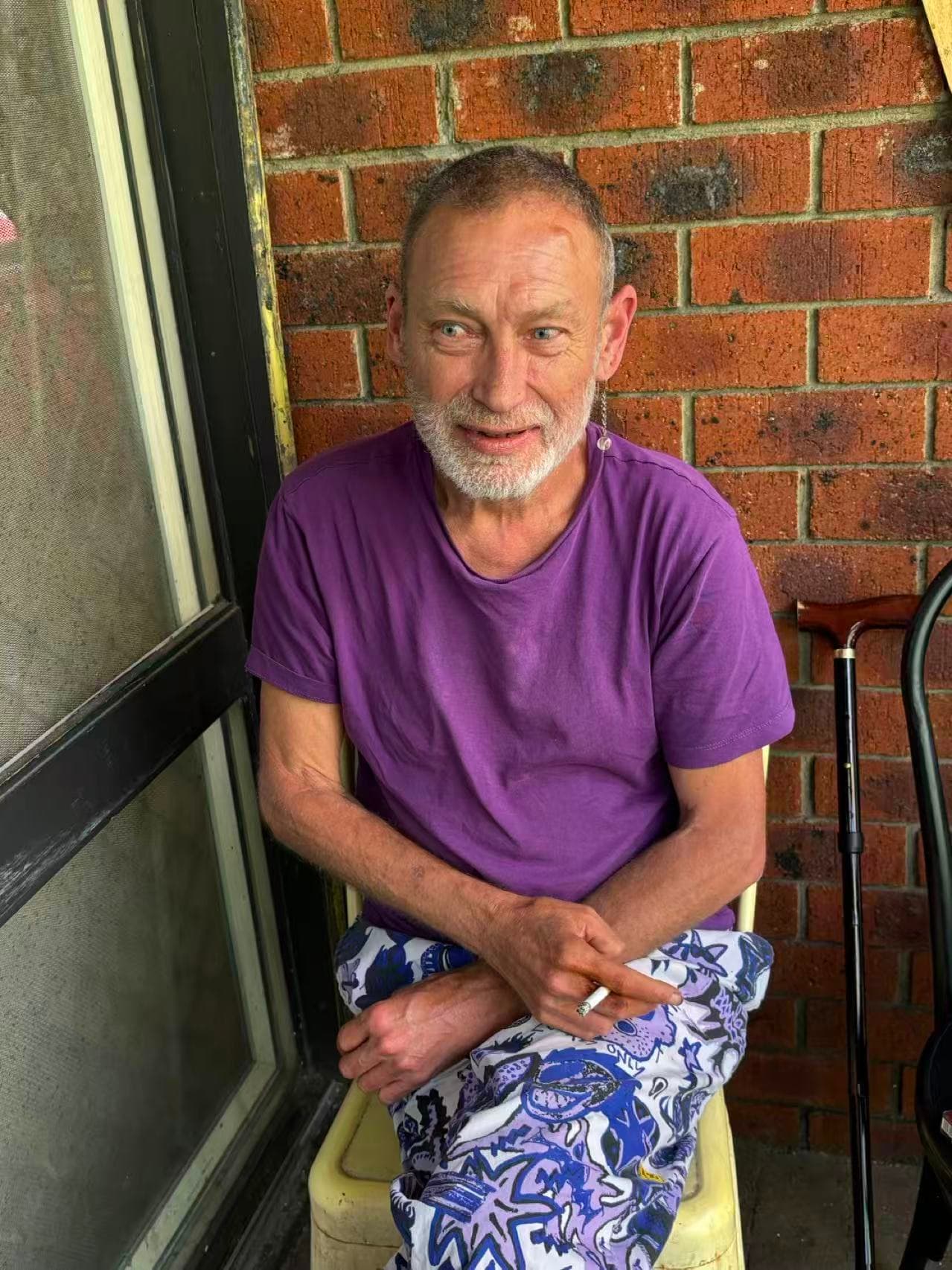 Resident relaxing on the verandah