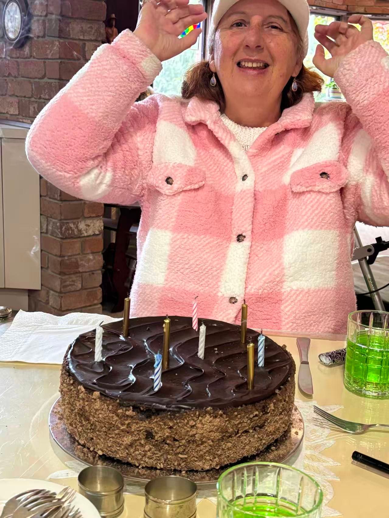 Resident celebrating a birthday with cake